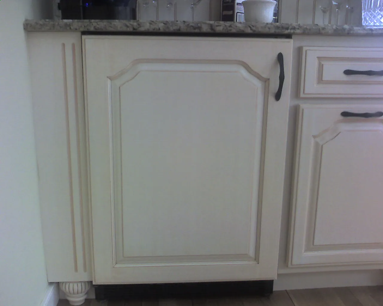 Kitchen cabinets painted a clean white