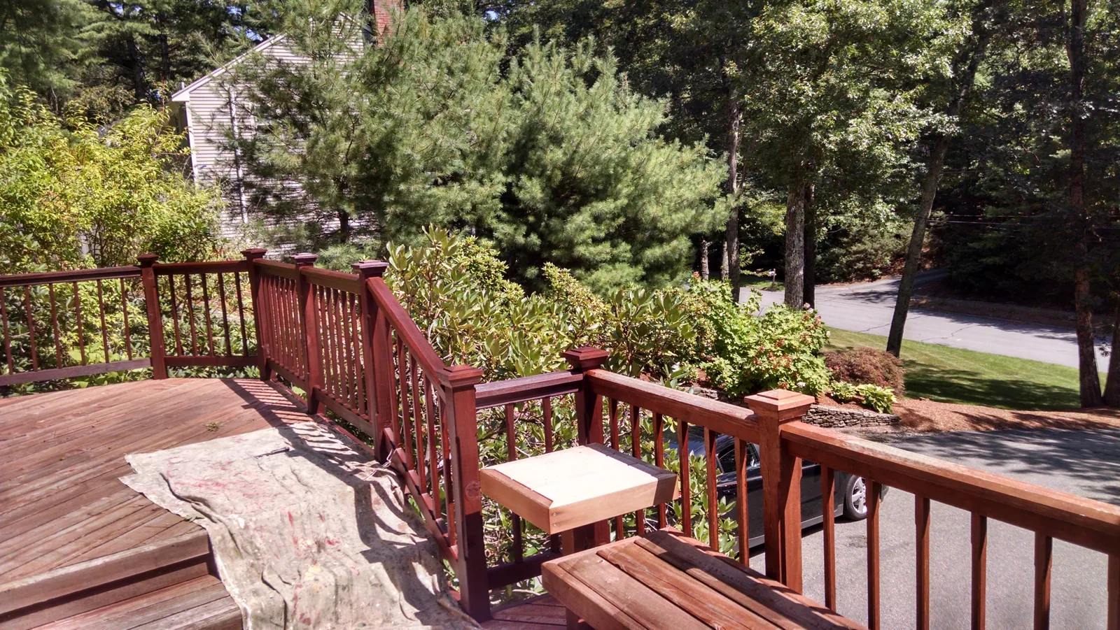 Deck and railings stained a deep redwood