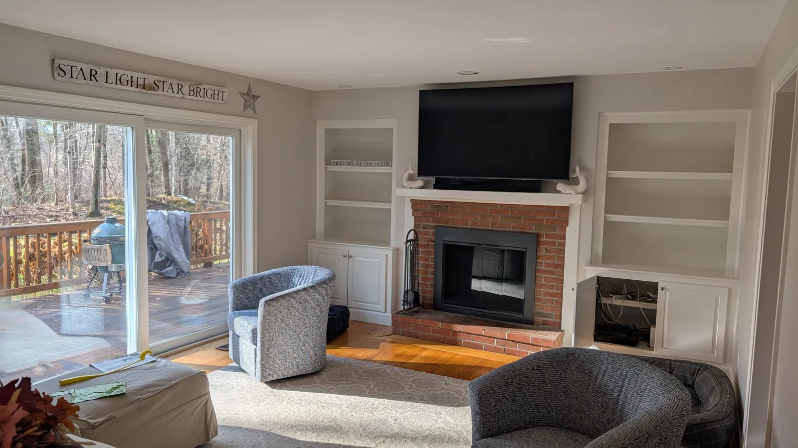 Living room with built-ins around the fireplace