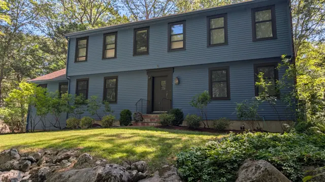 Slate-blue colonial with dark trim