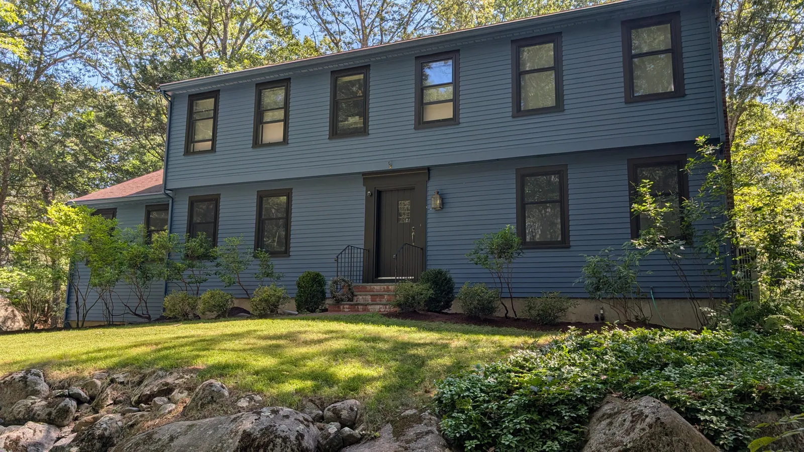 Slate-blue colonial with dark trim