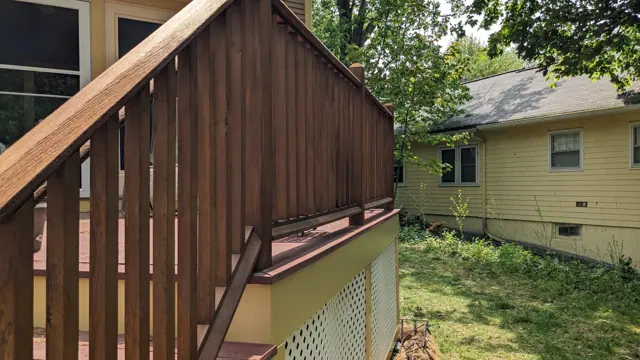 Stained deck stairs and railing