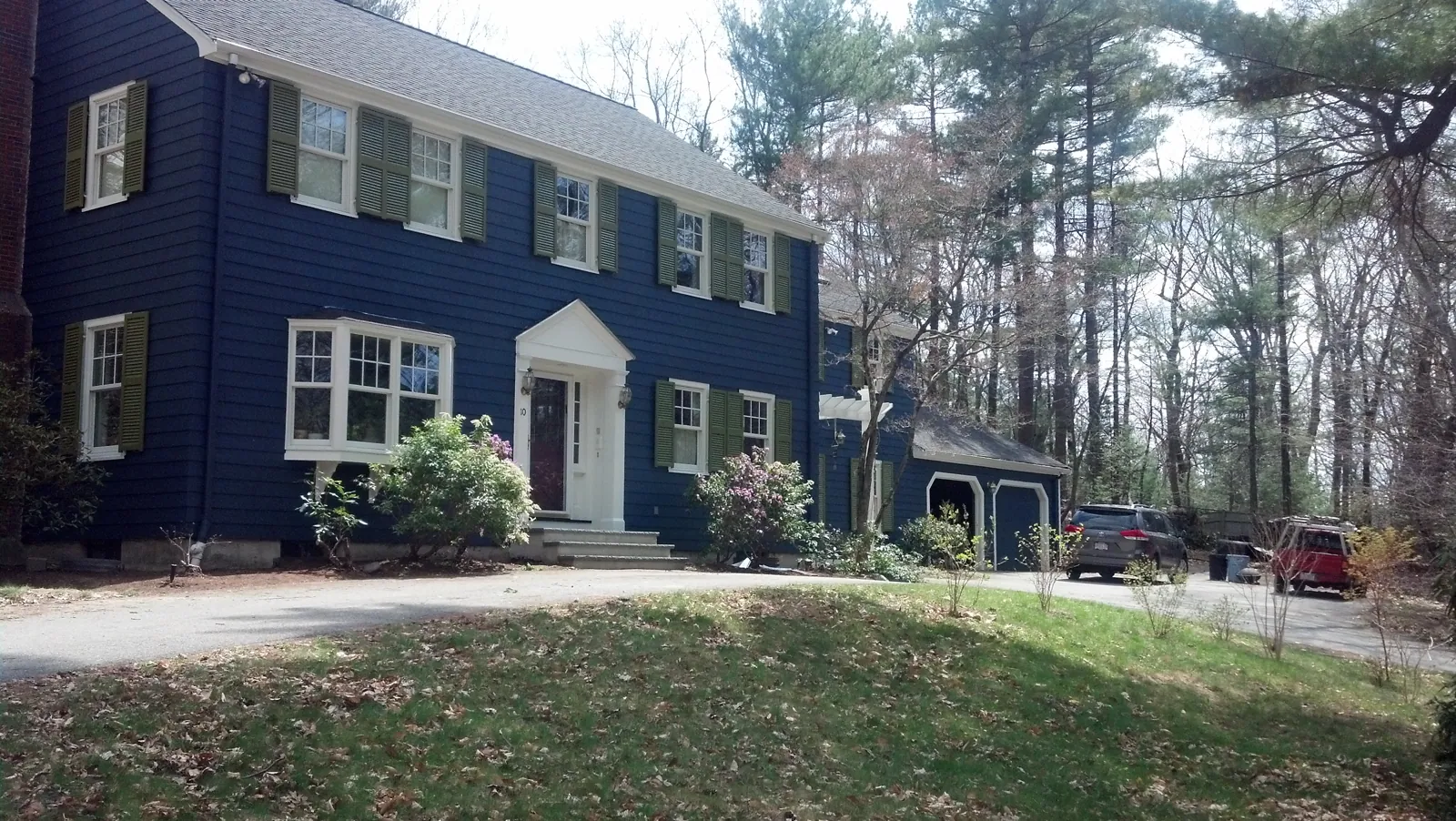 Navy colonial with white trim painted by Beacon